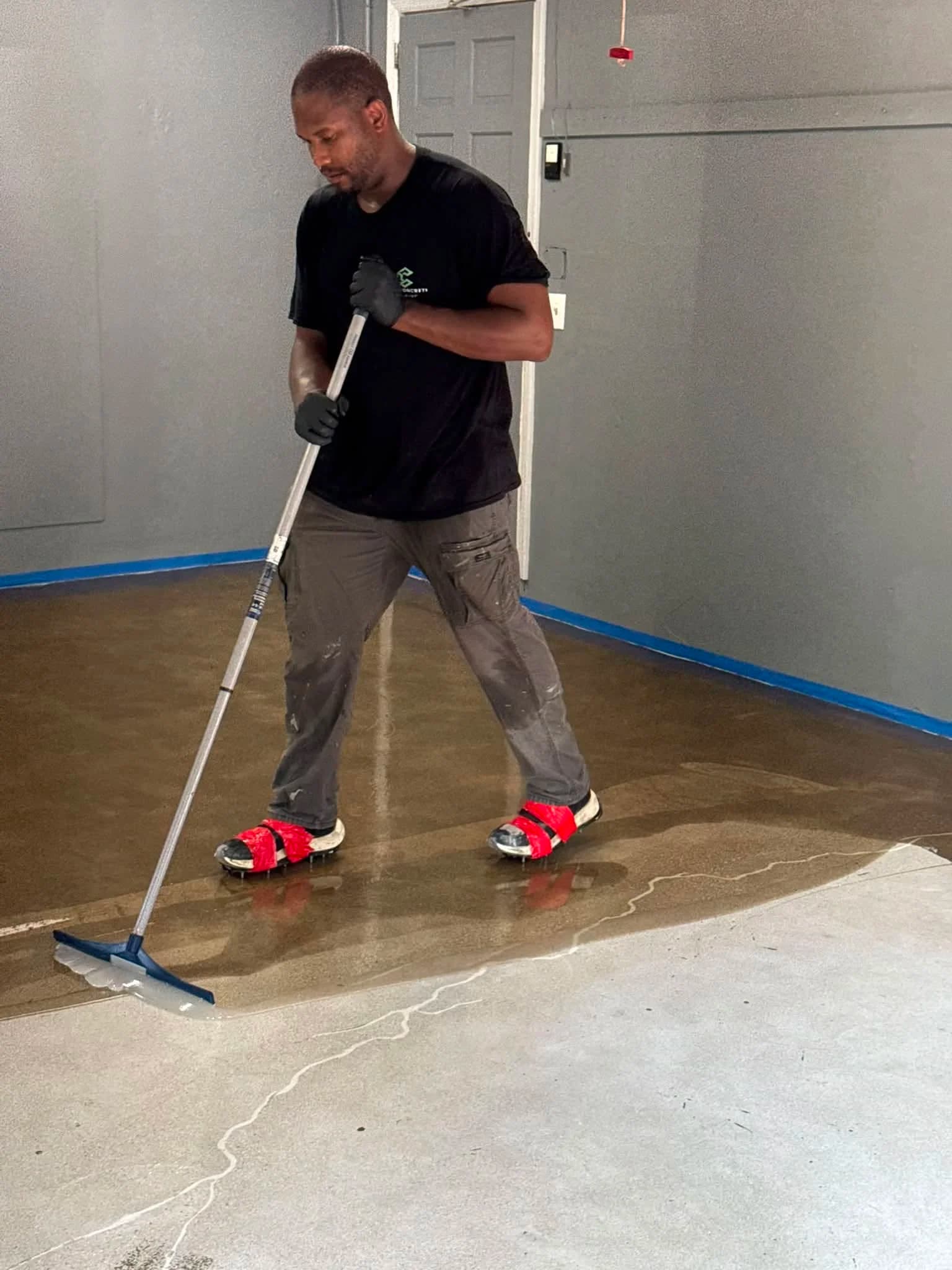 Finished concrete floor coating with moisture vapor barrier